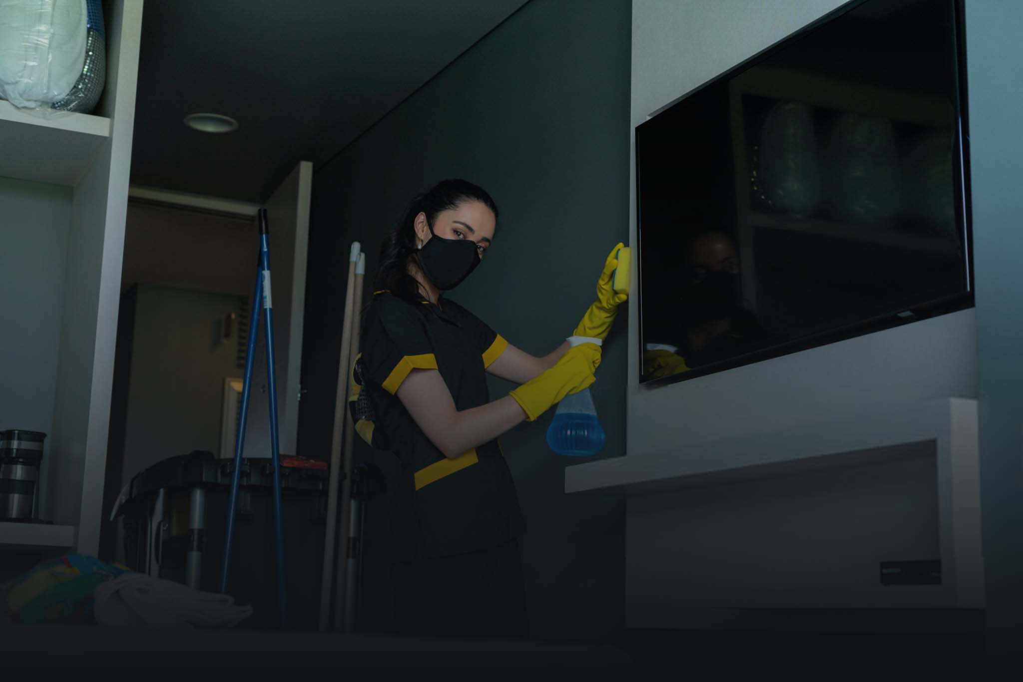 Woman wiorking in a room hotel